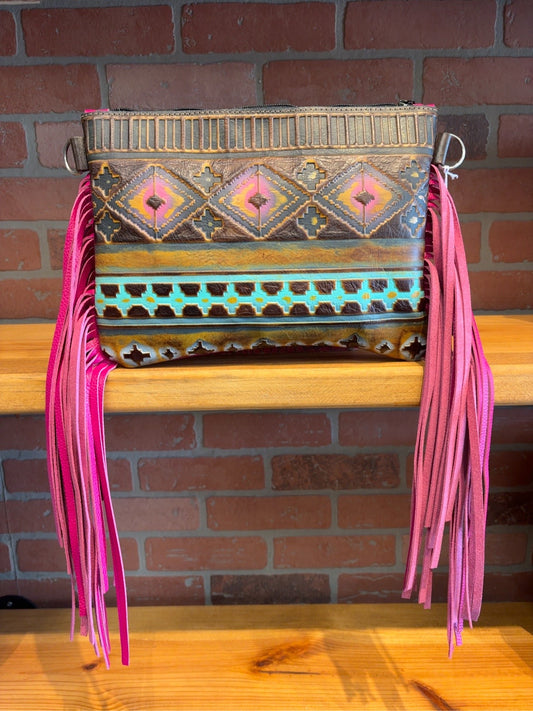 Front of Austin bag with Magenta Navajo embossed leather and long magenta fringe