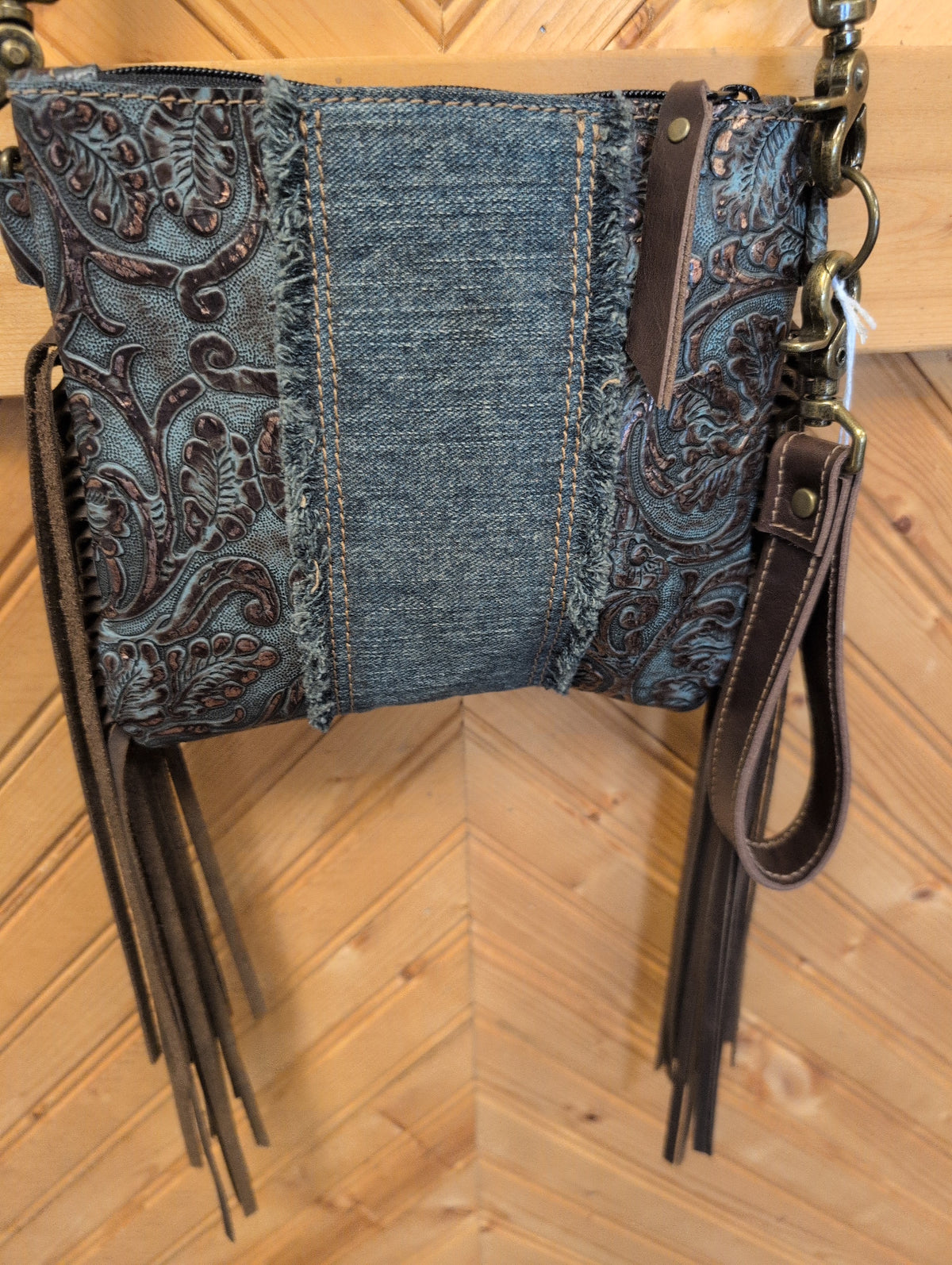 Blue and copper-toned floral Purse Sidekick with a frayed denim panel and long brown side fringe